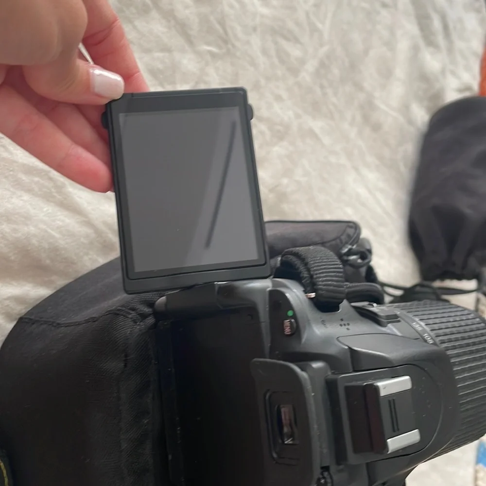 Nikon Camera with additional Lens, charger and cover